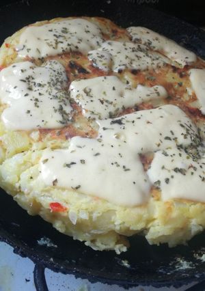 Una foto de Tortilla a la pizza 😱😋