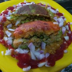 Tri colour aloo tikki with white matar A picture of Tri colour aloo tikki with white matar.