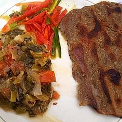 A picture of Bajre Ki Roti or baingan hari pyaz ki sabzi.