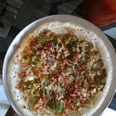 A picture of Vegetable cheese dosa.