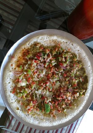 A picture of Vegetable cheese dosa.