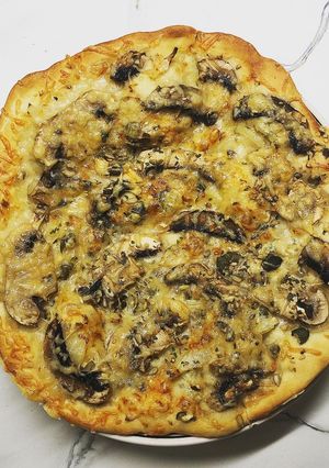 Une photo de Pizza aux champignons