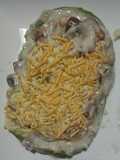 Calabacín relleno de setas y gambas
