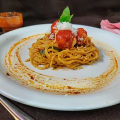 A picture of Paneer kofta sausy spaghetti.