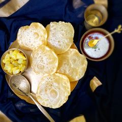 A picture of Luchi & Aloo Torkari.
