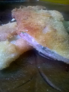 Una foto de Pencas envueltas en jamón a la milanesa
