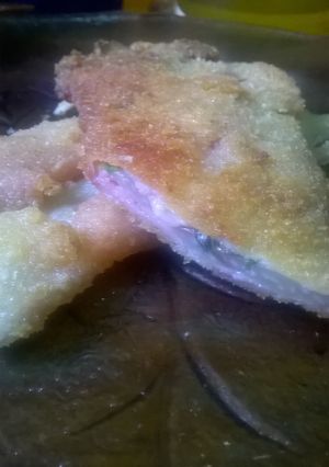 Una foto de Pencas envueltas en jamón a la milanesa