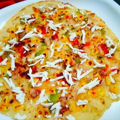 Vegetable Corn Uttapam A picture of Vegetable Corn Uttapam.