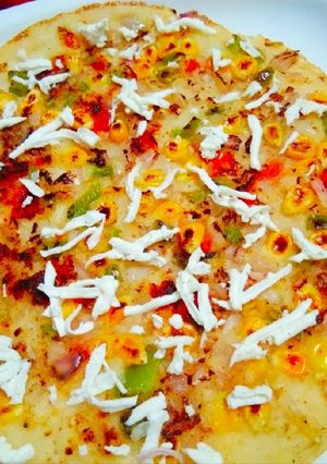 A picture of Vegetable Corn Uttapam.