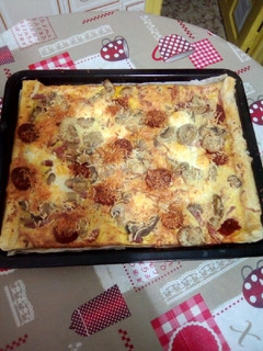 Una foto de Pizza de base patata