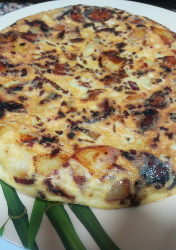 Una foto de Tortilla de patata y jamón serrano cecofry 4D