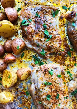 A picture of Ranch Pork Chops and Potatoes Sheet Pan Dinner.