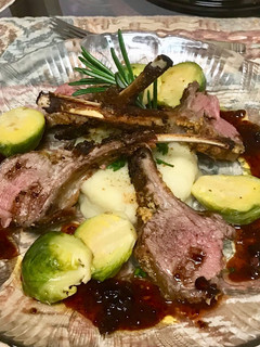 A picture of Grill rack of lamb with a red wine Balsamic vinaigrette sauce,.