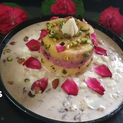 A picture of Saffroni Halwa With Rosey Kheer Delight.