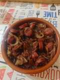 Chorizos criollos encebollados