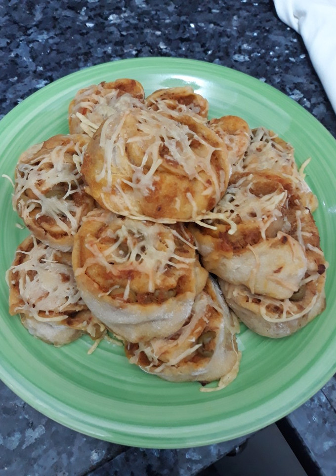 Una foto de Pizza enrrollada