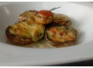 Una foto de Champiñones gratinados rellenos