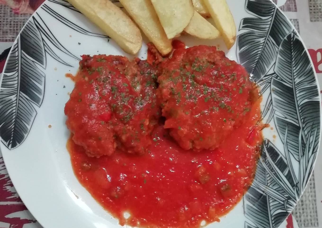 Filetes rusos en salsa de tomate