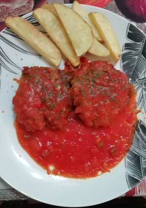 Una foto de Filetes rusos en salsa de tomate