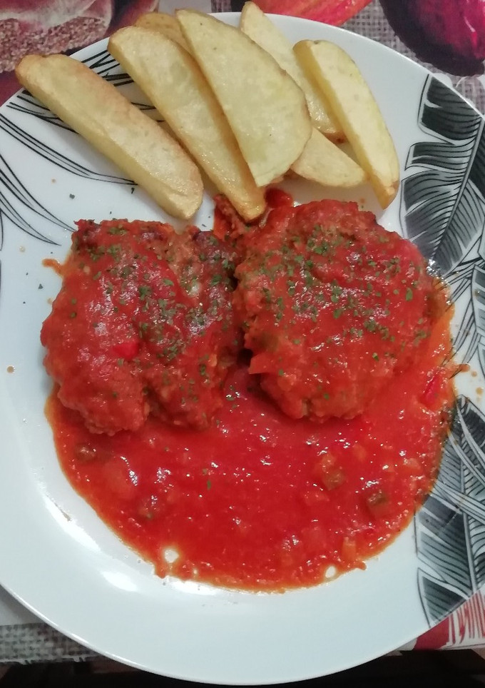 Una foto de Filetes rusos en salsa de tomate