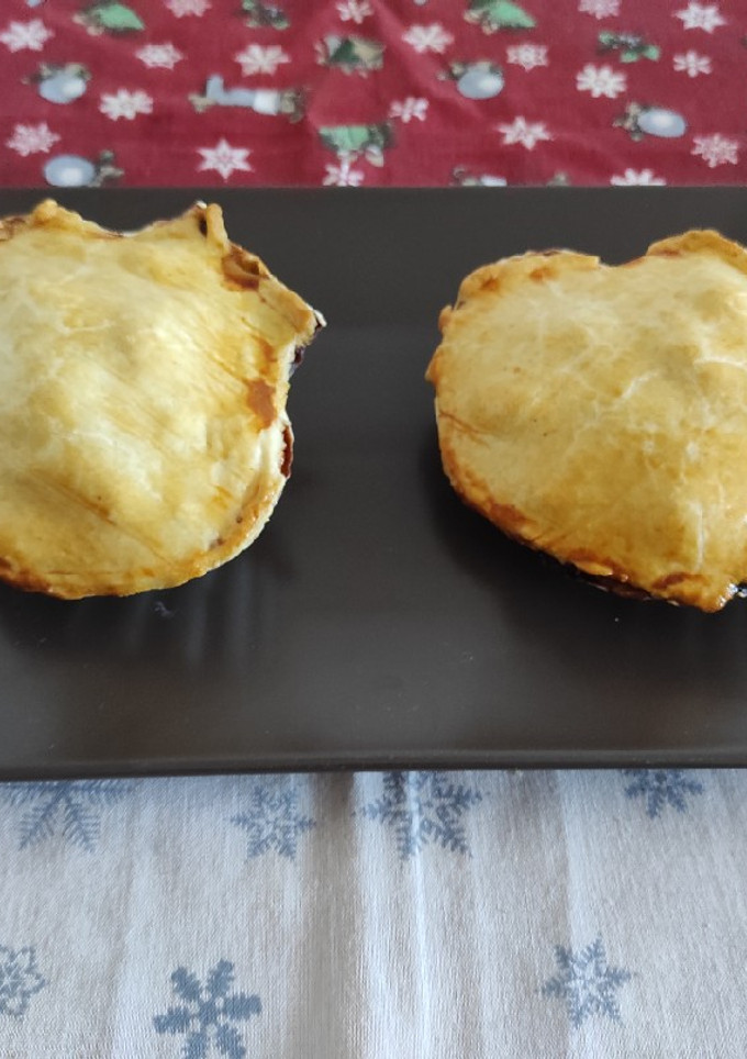 Una foto de Vieiras con langostinos