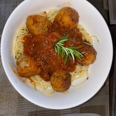 A picture of Meatballs with Rosemary and Tom Sauce.