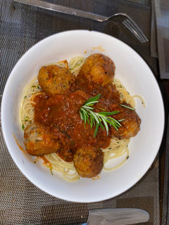 A picture of Meatballs with Rosemary and Tom Sauce.