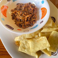 A picture of Fried yam with dry fish sauce.