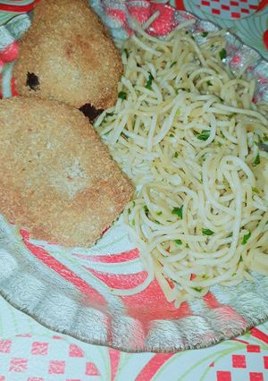 Una foto de Milas de berenjena con fideo al pesto
