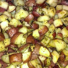 A picture of oven roasted herbed red potatoes.