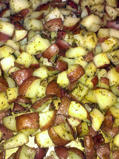 A picture of oven roasted herbed red potatoes.