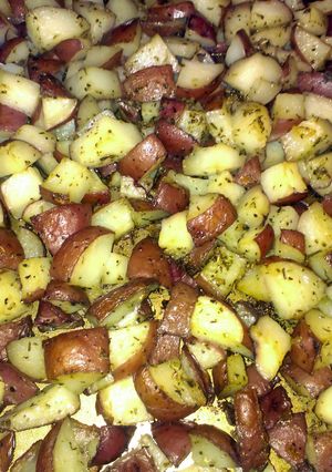 A picture of oven roasted herbed red potatoes.