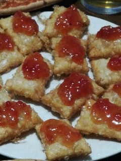 Una foto de Sobres de queso de cabra con mermelada de tomate