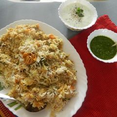 A picture of Pongal Kootu Veg Biryani.