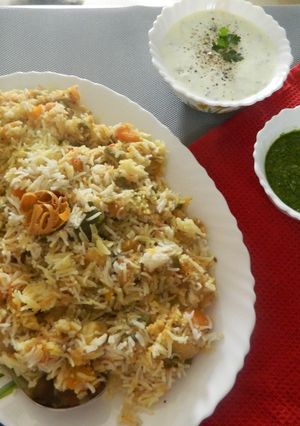A picture of Pongal Kootu Veg Biryani.