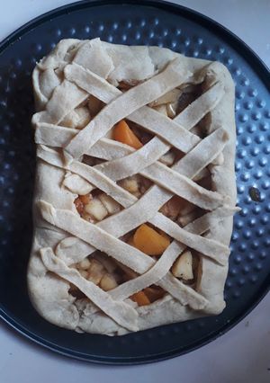 Una foto de Pie de manzana y durazno 🍎🍑