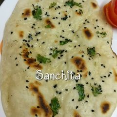 A picture of Tawa Butter Naan without Yeast.