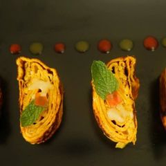 A picture of Tamagoyaki [ Japanese rolled omelet].