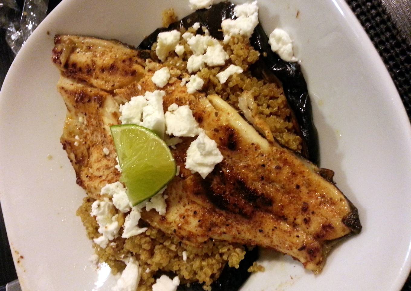 Pan seared trout served on quinoa chorizo eggplant and French feta salad