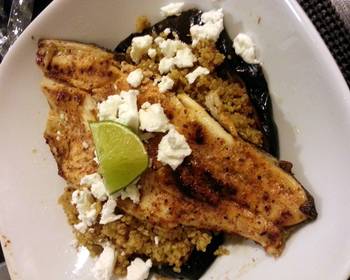 Ready to Serve Pan seared trout served on quinoa chorizo  eggplant and French feta salad Practical Delicious