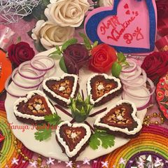 A picture of Beetroot heart with roasted peanuts.