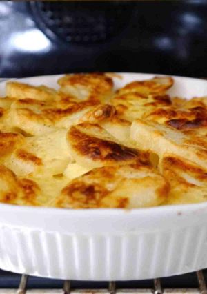 A picture of potato and onion bake.