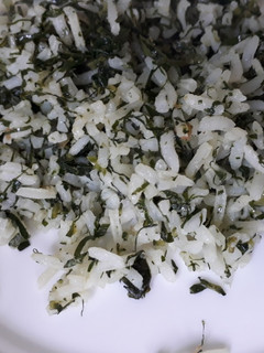 A picture of Left over rice and kales.