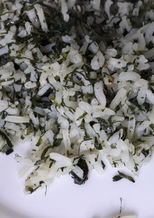 A picture of Left over rice and kales.