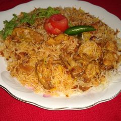 A picture of Awadhi chicken biryani.