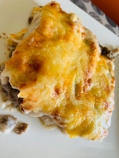 Una foto de Canelones de carne y champiñones