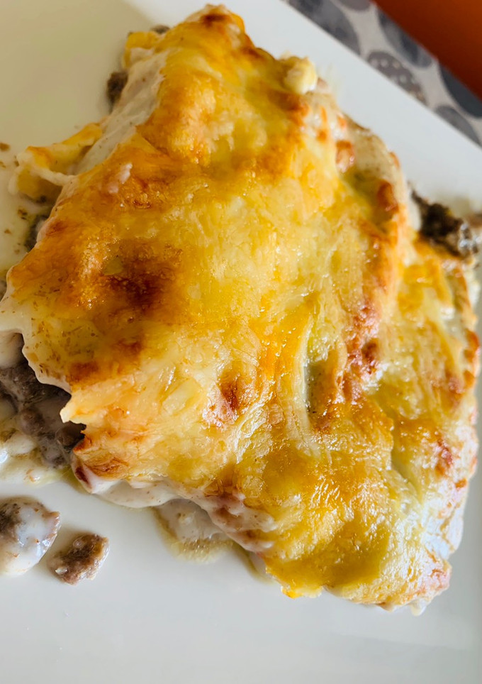 Una foto de Canelones de carne y champiñones