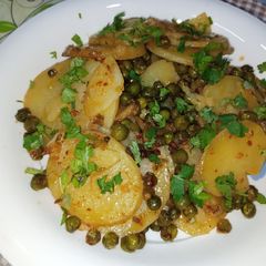 A picture of Crispy Potato And Pea Fry.