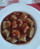 Ñoquis con salsa fileto