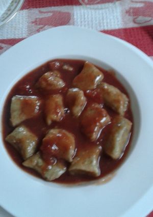 Una foto de Ñoquis con salsa fileto